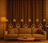 Desidiya® Diya Lights Diwali String Curtain Lights – Warm White Indoor & Outdoor Lights For Home, Wall, Window, Indian Wedding, Garden, Bedroom, Christmas, Party, And Festive Decor- Corded Electric